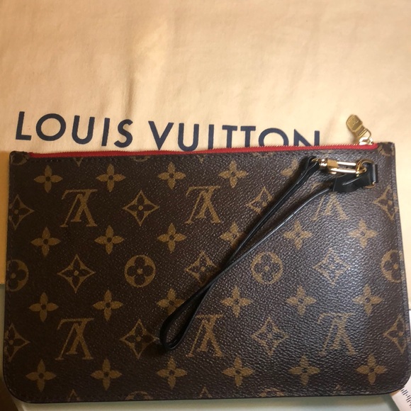 LV wristlet from World Tour collection. Authentic